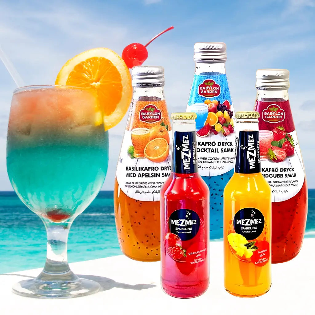 Valikoima Lähi-idän perinteisiä juomia tarjoiltuna laseissa pöydällä.