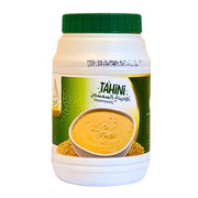 Iso tahini-siemenvoipurkki 800 g vihreällä kannella, itämainen aihe etiketissä.
