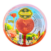 Asbal-hunajakakku pyöreässä muovipakkauksessa, 250 g, etiketissä kuvana hunajakakku ja kukkia.