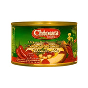 Purkki Chtoura-hummusta, chikkapapuja, tahinia ja ekstra-chilipippuria, idänomainen ruokatuote.