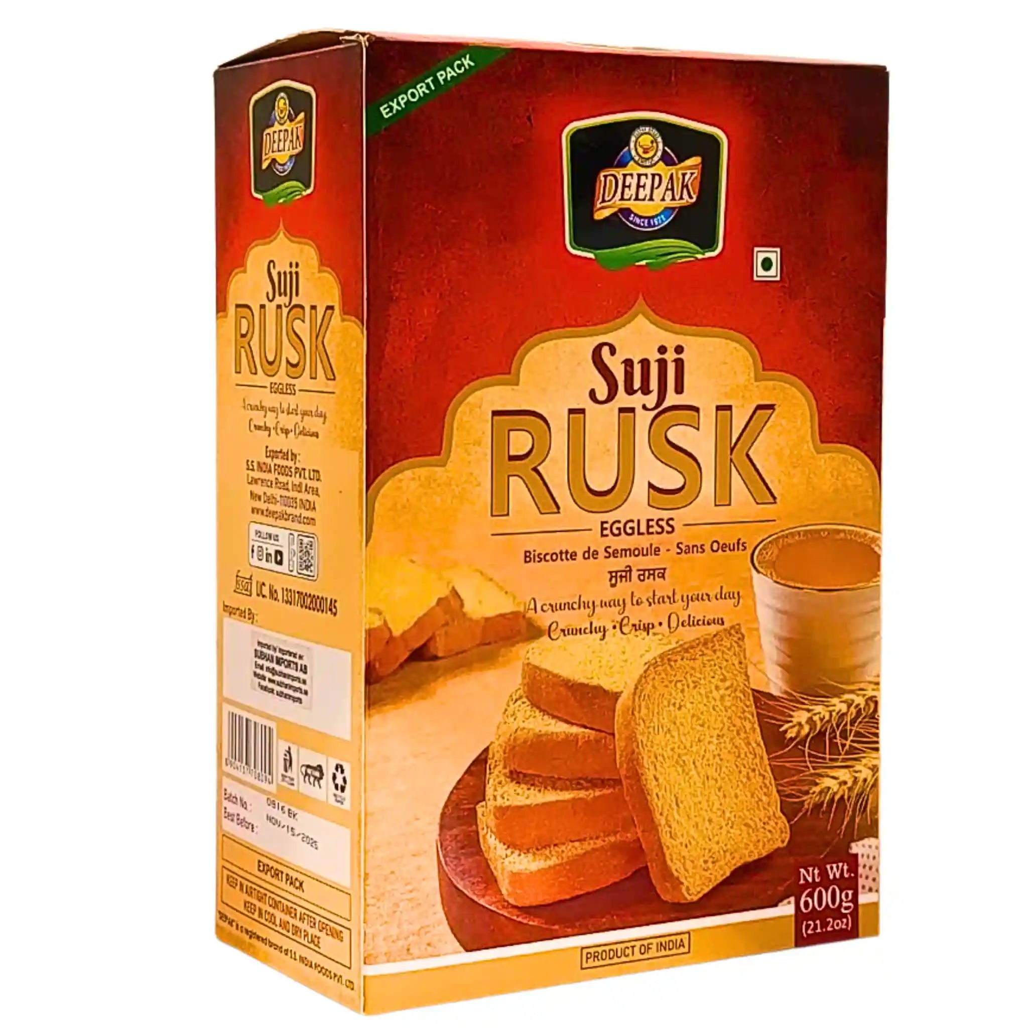 Deepak Suji Rusk 600 g kartonki, munattomat keksilevyt, tee ja vehnästru valkoista taustaa vasten