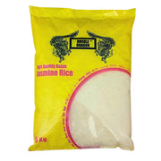 5 kg:n riisipakkaus, jossa teksti High Quality Asian Jasmine Rice, keltainen pussi drakonmotiivilla.