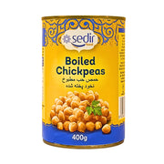 Purkki keitettyjä kikherneitä 400 g, Sedir, itämaisia säilykkeitä keltaisella taustalla