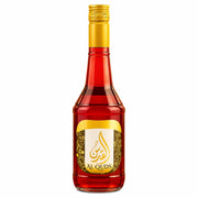 Flaska granatäpplekoncentrat Al Quds med guldkork och röd vätska, 600 ml
