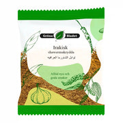Pussi irakilainen shawerma-mauste, vihreä design, valkosipuli- ja maustekuvaus.
