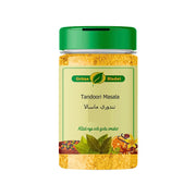 Gröna Bladet Tandoori Masala -maustepurkki 150g, jossa on vihreä kansi ja mausteita etiketissä.