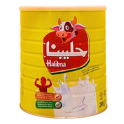 Halibna maitojauhe 2500 g keltaisessa tölkillä, jossa on lehmän kuva ja etiketillä valuvaa maitoa.