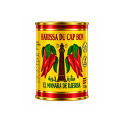 Harissa-pasta i gul–röd plåtburk med chili och 135 g etikett