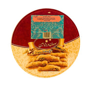 Pyöreä pakkaus iranilaista makeaa leivonnaista Sohan, koristeltu pistaasipähkinöillä.