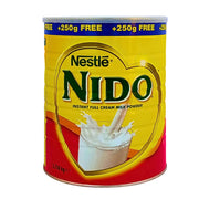 Nido maitojauhe purkki 2,5 kg, keltainen ja punainen pakkaus, jossa etupuolella maitolasillinen