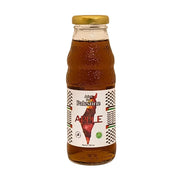 Lasipullo omenamehua, etiketissä teksti 'Juice for Palestine Apple', 250 ml.