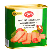 Lounasmakkara 340 g kultaisessa purkissa, jossa on halal-symboli, viipaloitu makkara, kasvit ja kukko etiketissä.