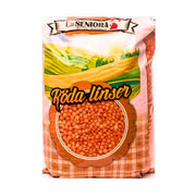 Förpackning med röda linser, tydlig etikett, orientaliska matvaror, 900g.
