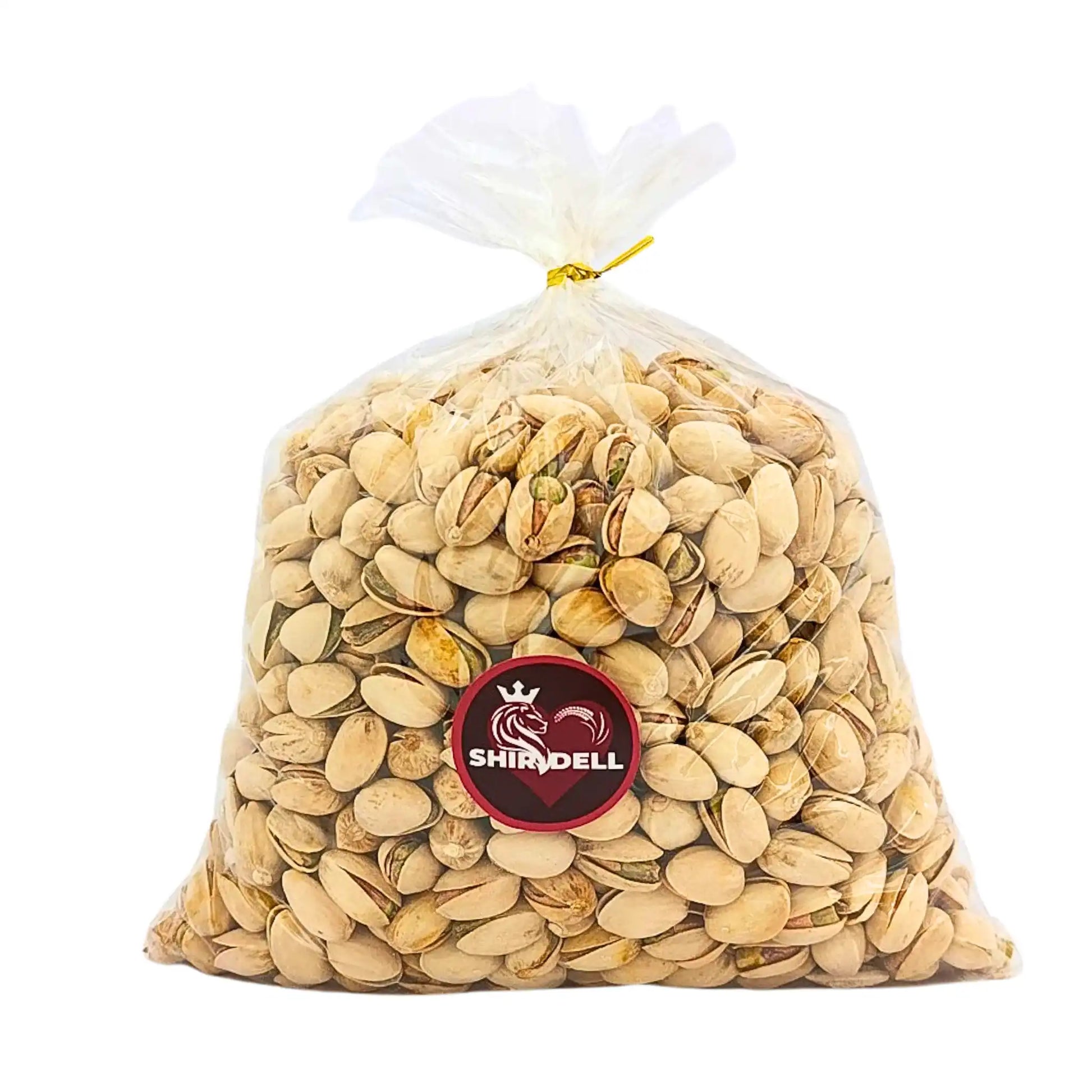 Paahdettuja ja suolattuja pistakepähkinöitä läpinäkyvässä muovipussissa, 1 kg, lähikuva