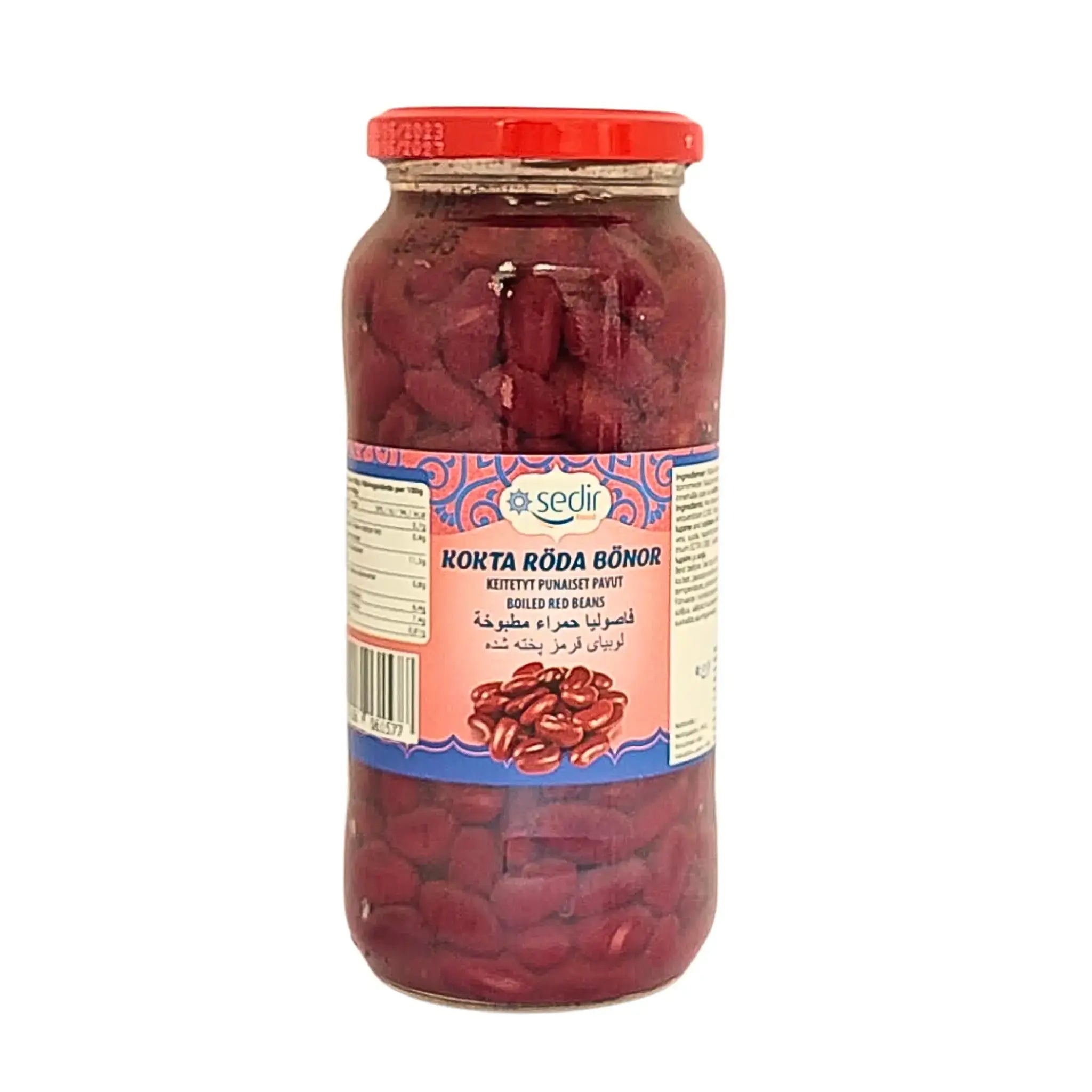 Glasburk med kokta röda bönor, orientalisk livsmedel, tydlig etikett, röda lock.