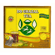 Do Ghazal -tepakkaus, kardemumman maku, 100 teepussia, keltainen pahvipakkaus teelasin ja kardemummahedelmien kuvilla.